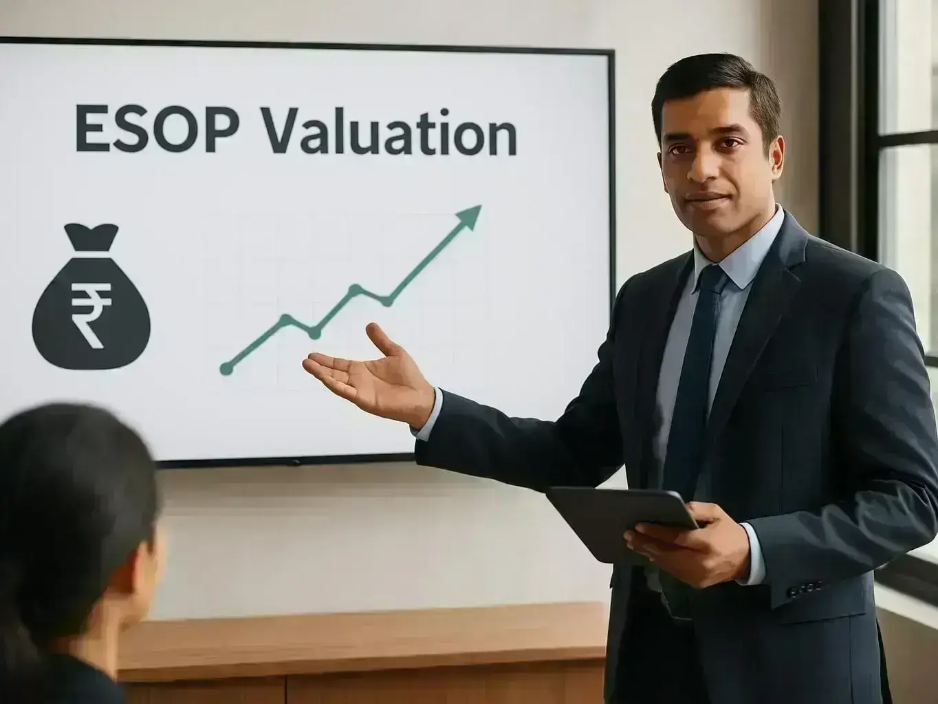 Startup founder discussing ESOP valuation report in Betma office